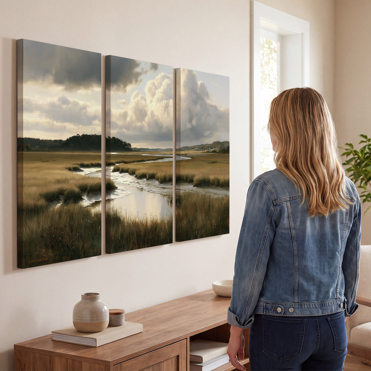 Pools of still water reflecting a dramatic cloud-filled sky across a golden marsh 3 piece canvas wall art three panel arrangement on a wall
