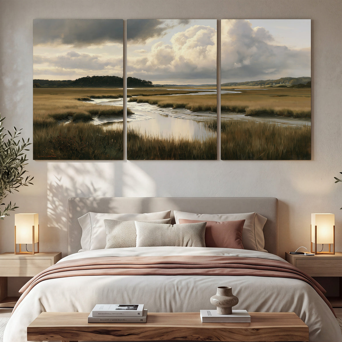 Pools of still water reflecting a dramatic cloud-filled sky across a golden marsh 3 piece canvas wall art displayed in a bedroom