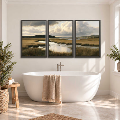Pools of still water reflecting a dramatic cloud-filled sky across a golden marsh 3 piece framed canvas wall art styled in an interior