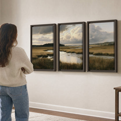 Pools of still water reflecting a dramatic cloud-filled sky across a golden marsh 3 piece framed canvas wall art three panel arrangement on a wall