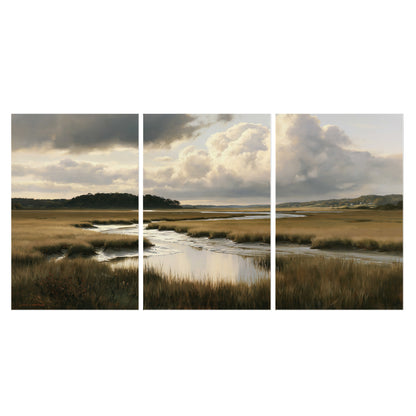Pools of still water reflecting a dramatic cloud-filled sky across a golden marsh set of 3 poster prints viewed straight on
