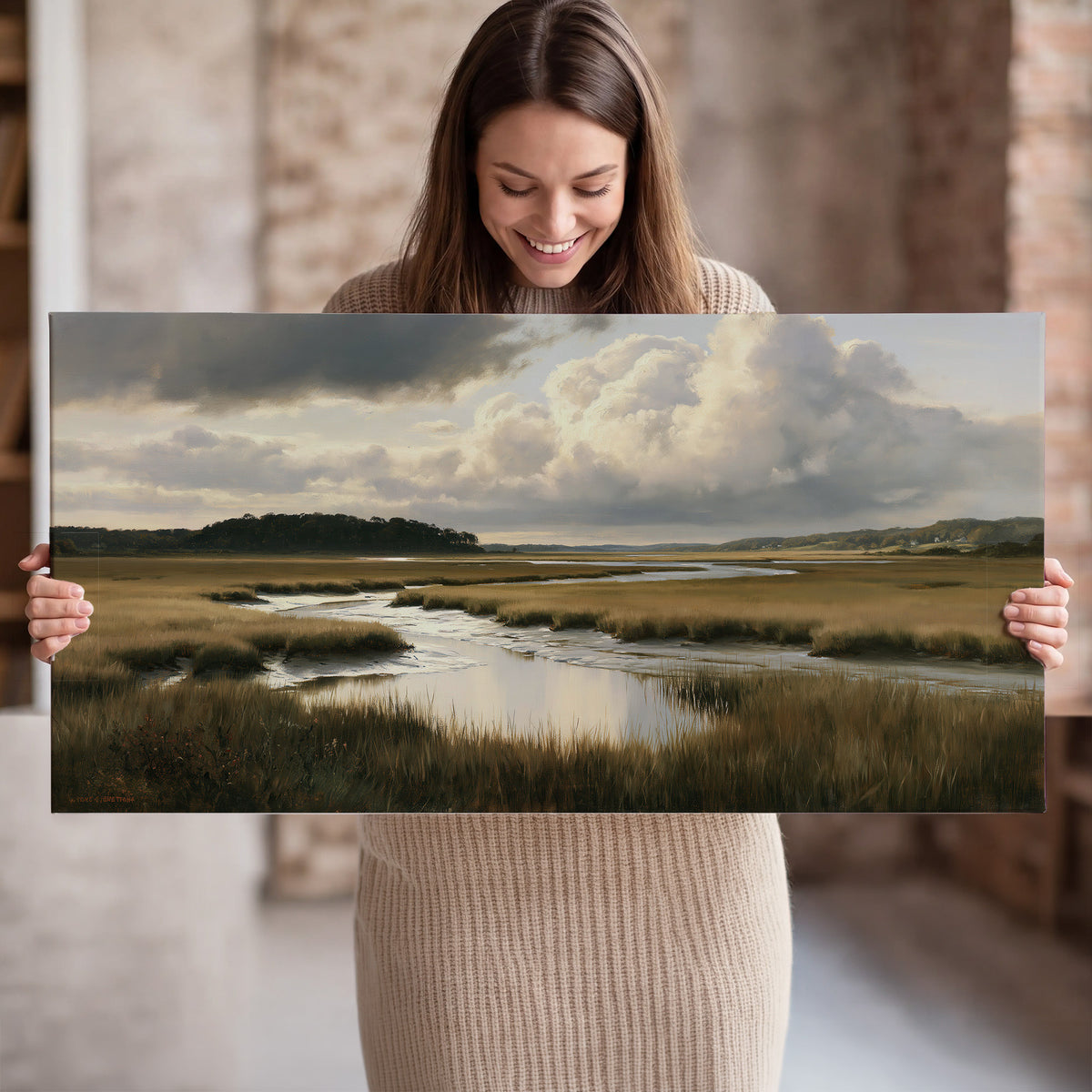 Pools of still water reflecting a dramatic cloud-filled sky across a golden marsh single canvas wall art held in hands