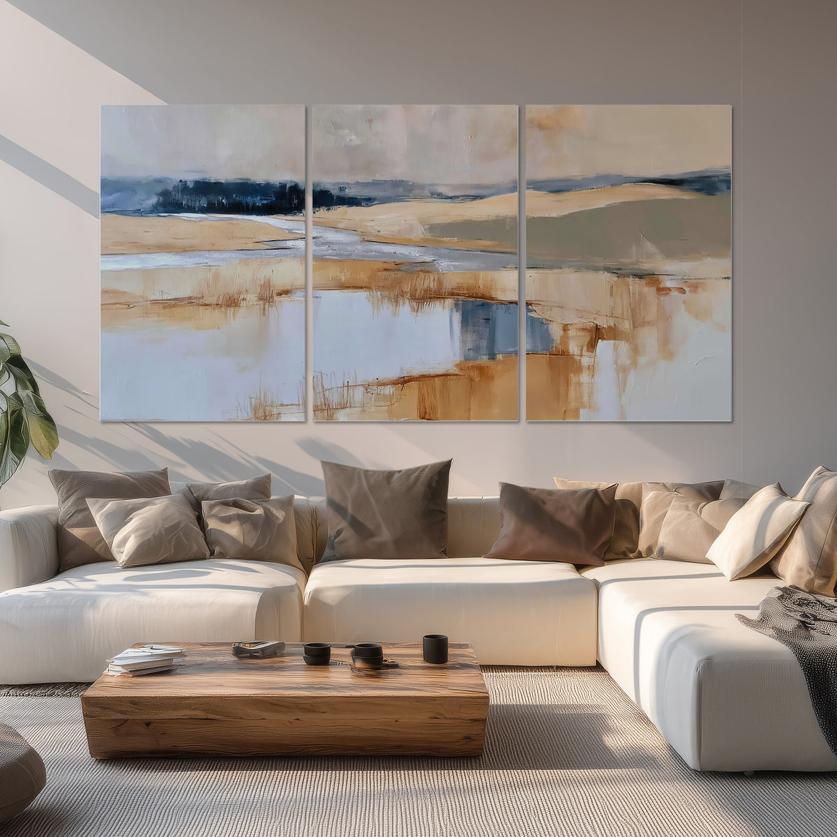 Soft horizontal bands of blue, ochre and ivory suggesting a reflected marsh landscape set of 3 poster prints displayed in a living room