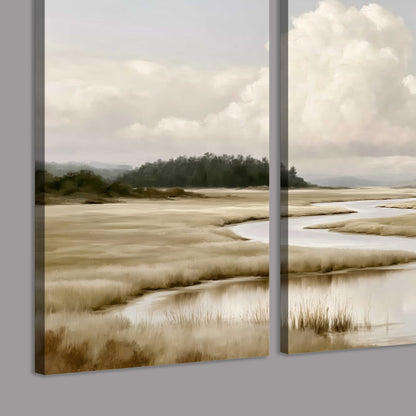 A pale winding waterway crossing quiet wetlands beneath billowing white clouds 3 piece canvas wall art room and product view