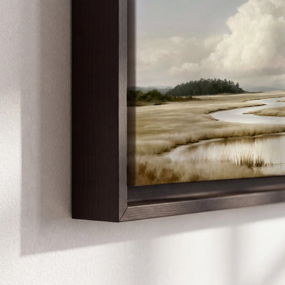 A pale winding waterway crossing quiet wetlands beneath billowing white clouds 3 piece framed canvas wall art material and edge close up