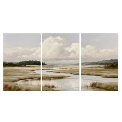 A pale winding waterway crossing quiet wetlands beneath billowing white clouds set of 3 poster prints viewed straight on