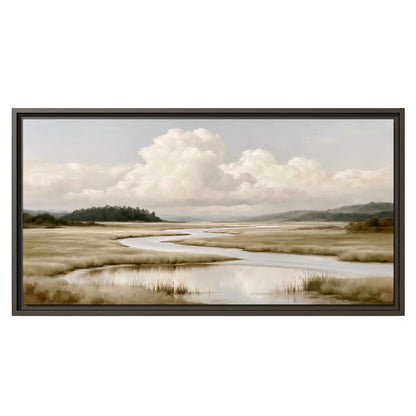A pale winding waterway crossing quiet wetlands beneath billowing white clouds single framed canvas wall art viewed straight on