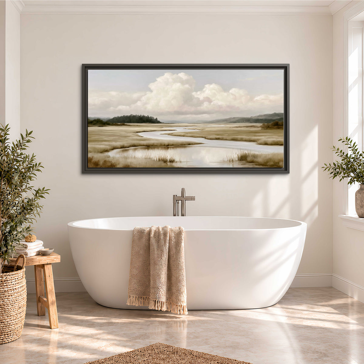 A pale winding waterway crossing quiet wetlands beneath billowing white clouds single framed canvas wall art styled in an interior