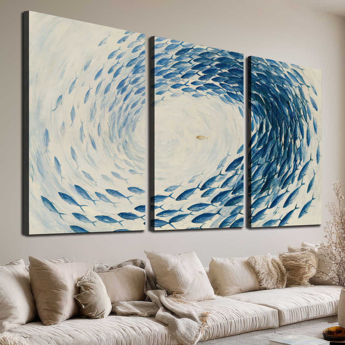A circular school of blue fish flowing around a pale open center 3 piece canvas wall art room and product view
