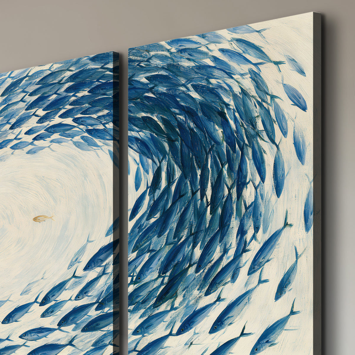A circular school of blue fish flowing around a pale open center 3 piece canvas wall art room and product view