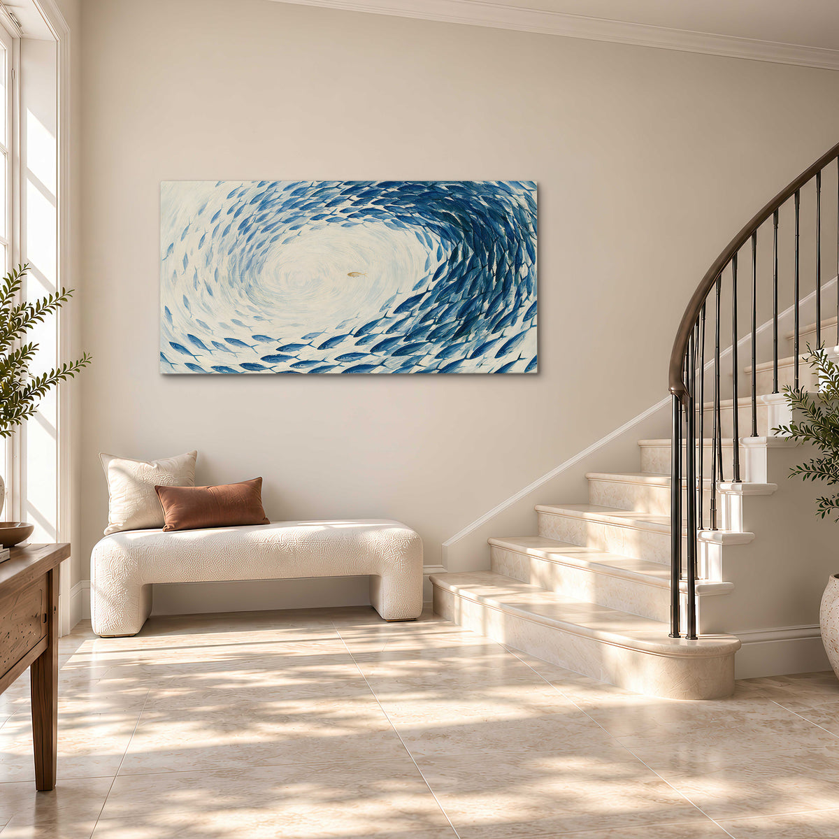 A circular school of blue fish flowing around a pale open center single canvas wall art styled in an interior