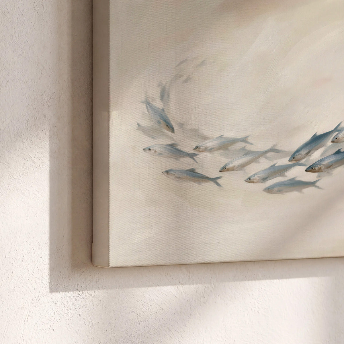 A sweeping school of small gray fish curving across a pale neutral background 3 piece canvas wall art material and edge close up
