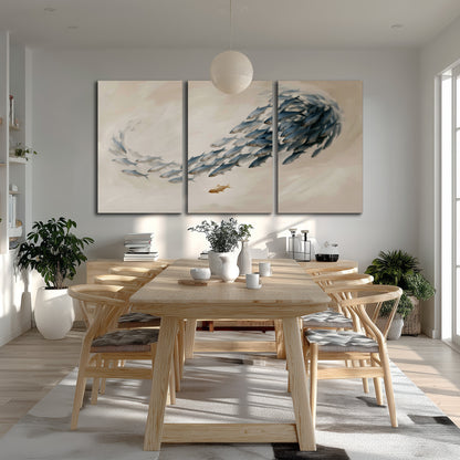 A sweeping school of small gray fish curving across a pale neutral background 3 piece canvas wall art room and product view