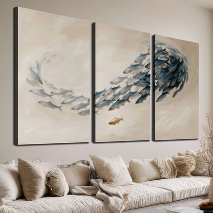 A sweeping school of small gray fish curving across a pale neutral background 3 piece canvas wall art room and product view