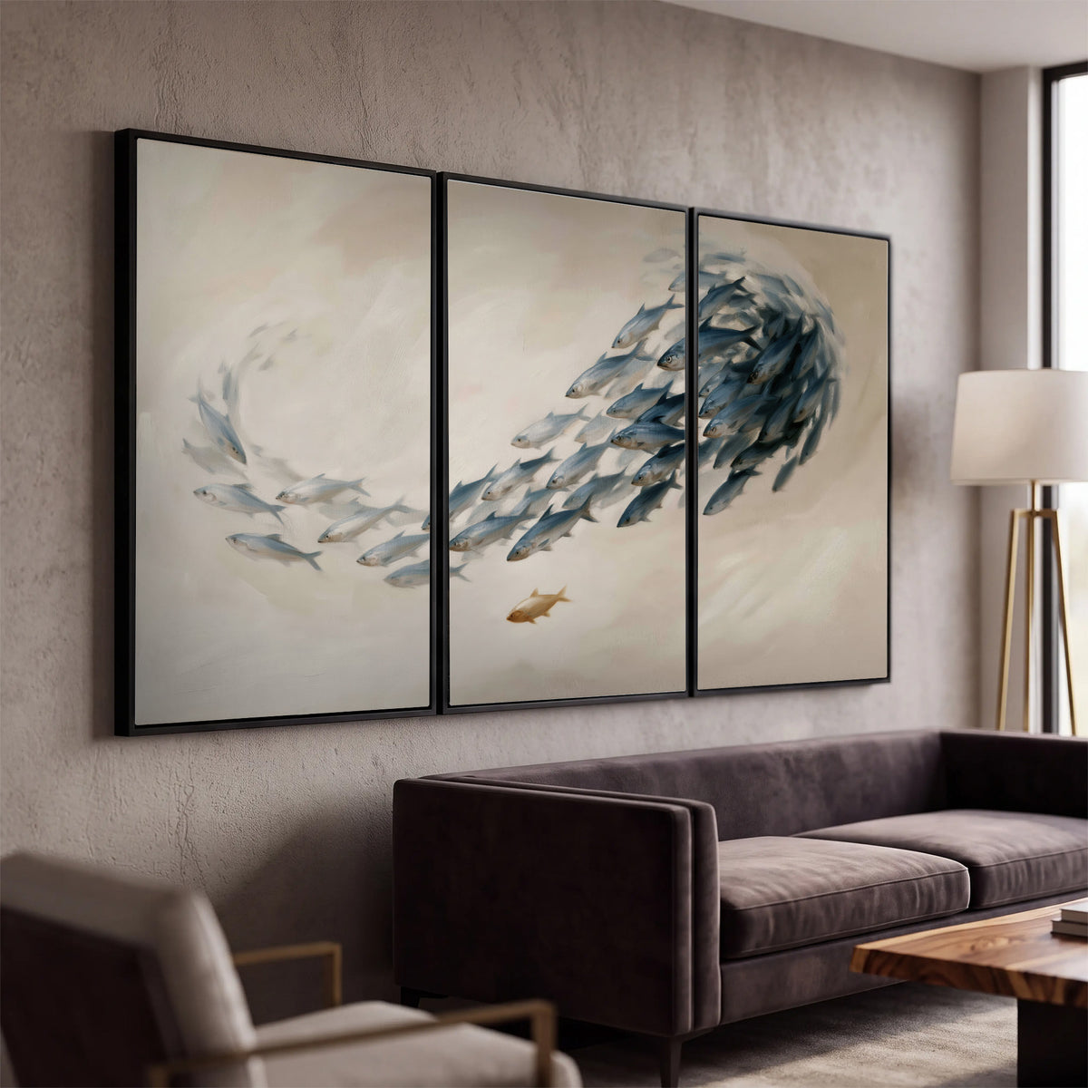 A sweeping school of small gray fish curving across a pale neutral background 3 piece framed canvas wall art displayed in a modern living room