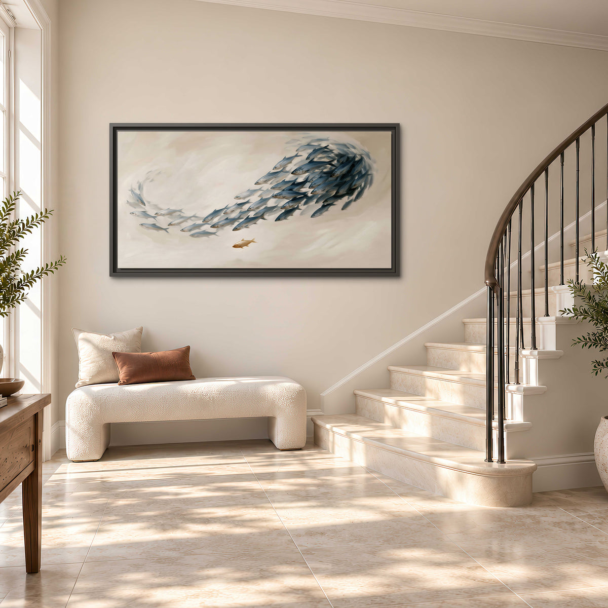 A sweeping school of small gray fish curving across a pale neutral background single framed canvas wall art styled in an interior