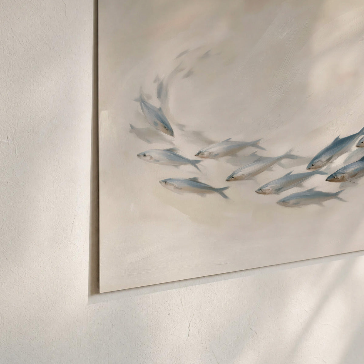 A sweeping school of small gray fish curving across a pale neutral background set of 3 poster prints material and edge close up