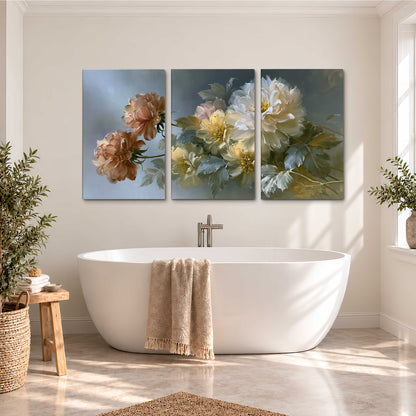 Cream, blush and rust-colored garden flowers gathered against a muted blue-gray background 3 piece canvas wall art styled in an interior