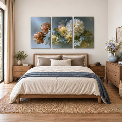 Cream, blush and rust-colored garden flowers gathered against a muted blue-gray background 3 piece canvas wall art styled in an interior