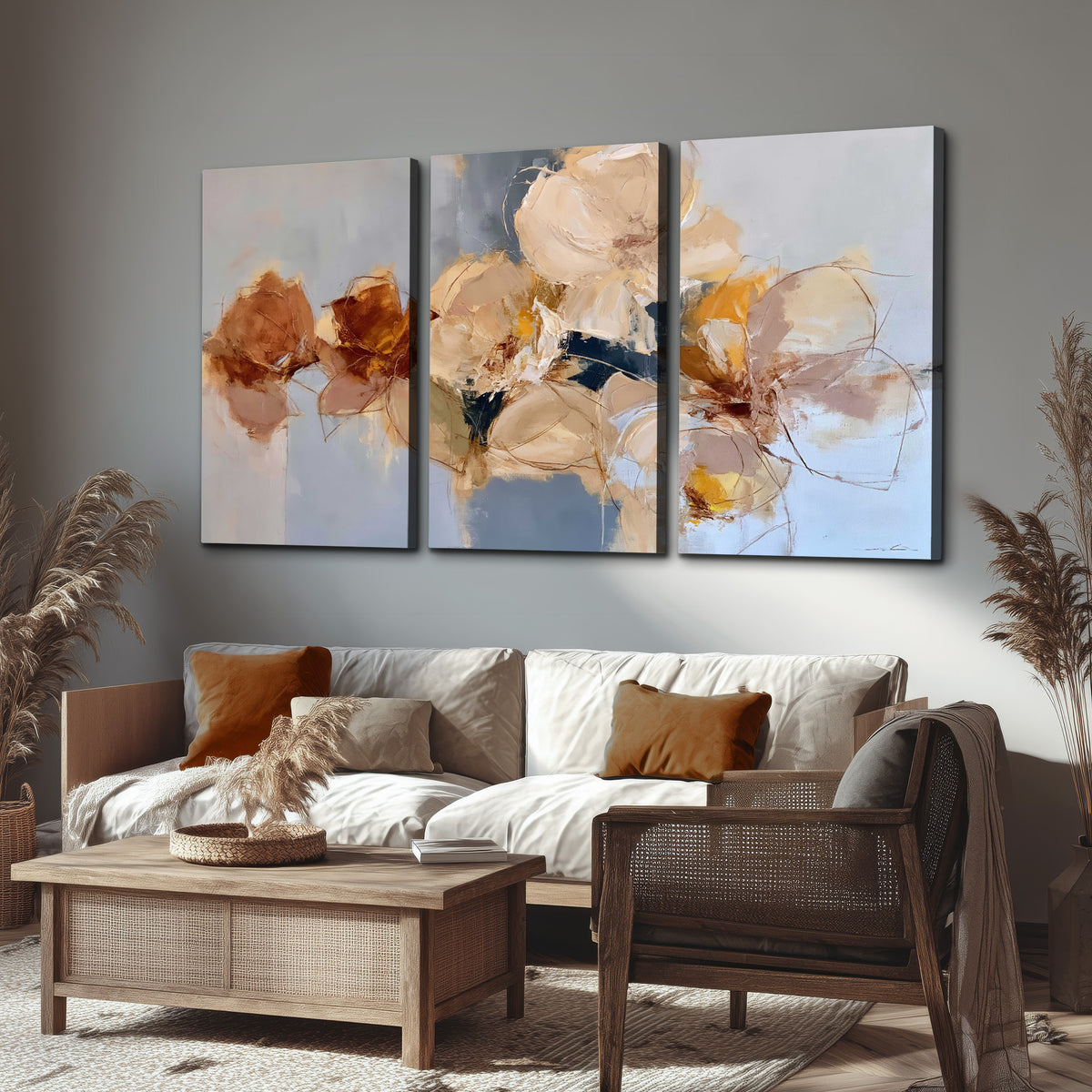 Loose ivory and ochre flower forms layered over a pale blue painterly background 3 piece canvas wall art displayed in a rustic living room