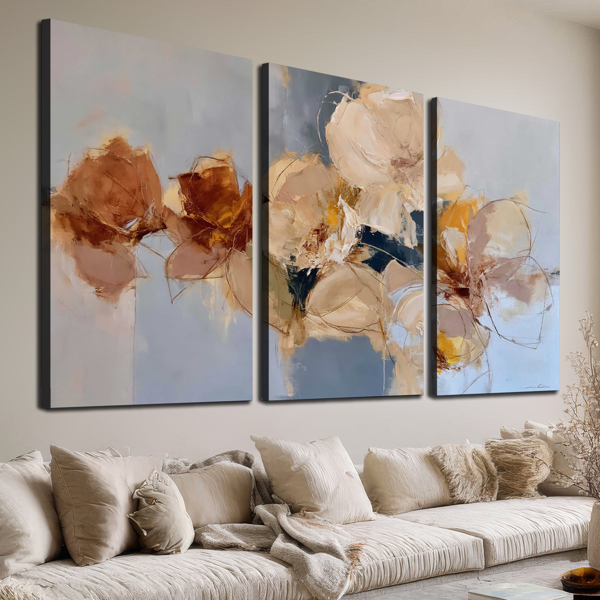 Loose ivory and ochre flower forms layered over a pale blue painterly background 3 piece canvas wall art room and product view