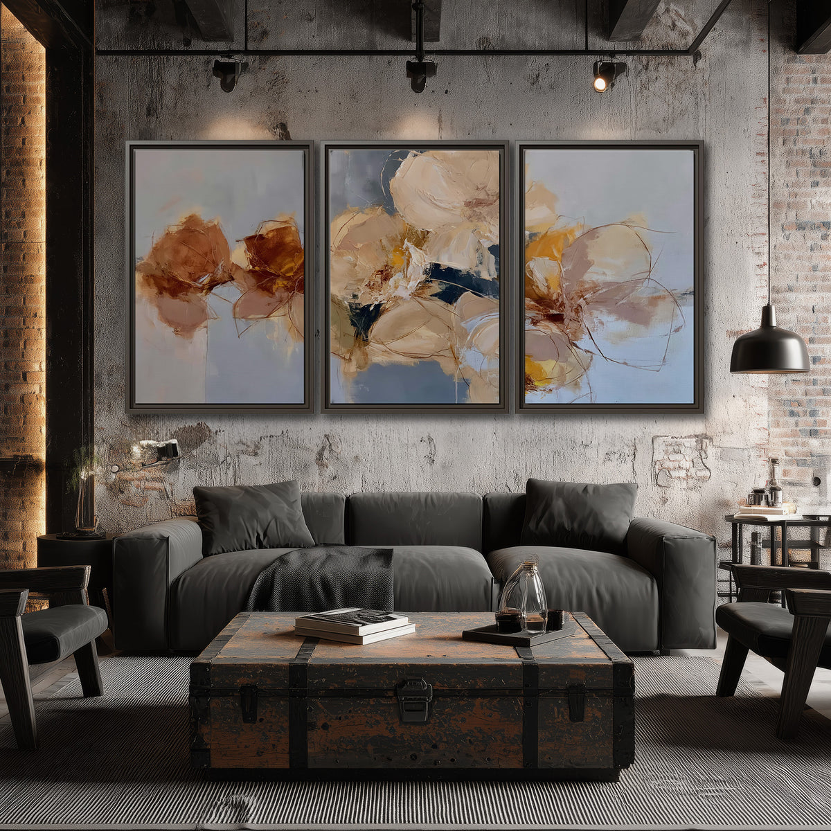 Loose ivory and ochre flower forms layered over a pale blue painterly background 3 piece framed canvas wall art displayed in a industrial room
