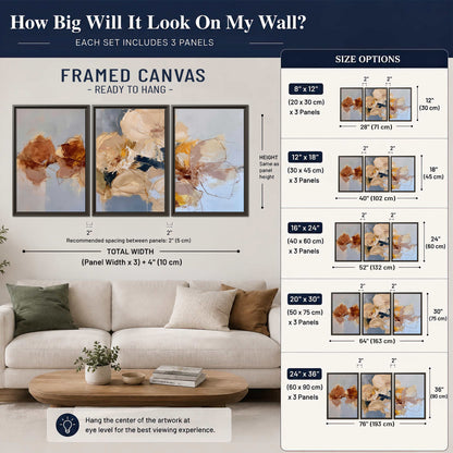 Loose ivory and ochre flower forms layered over a pale blue painterly background 3 piece framed canvas wall art size guide above a sofa; room view is illustrative