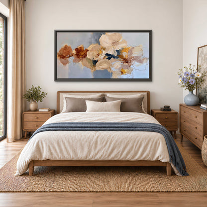 Loose ivory and ochre flower forms layered over a pale blue painterly background single framed canvas wall art styled in an interior