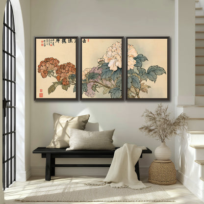 Pale pink peonies and green leaves on a warm beige background with decorative script 3 piece framed canvas wall art displayed in a entryway