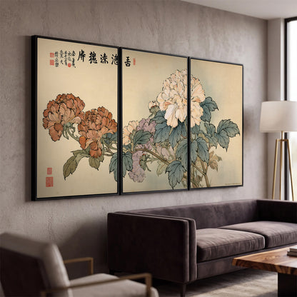 Pale pink peonies and green leaves on a warm beige background with decorative script 3 piece framed canvas wall art displayed in a modern living room