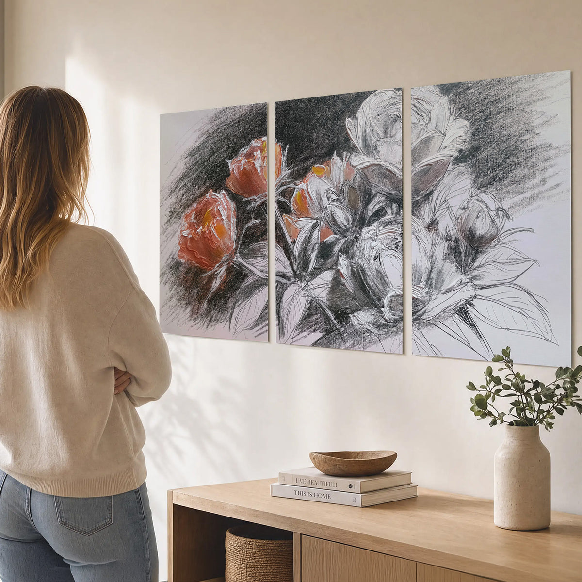 Expressive charcoal-style roses with muted rust petals against a textured-look gray background set of 3 poster prints three panel arrangement on a wall