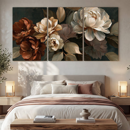 Large ivory roses and warm rust blooms against a deep shadowed background 3 piece canvas wall art displayed in a bedroom
