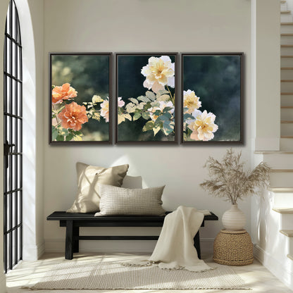 White and peach roses with green leaves against a deep blue-green background 3 piece framed canvas wall art displayed in a entryway