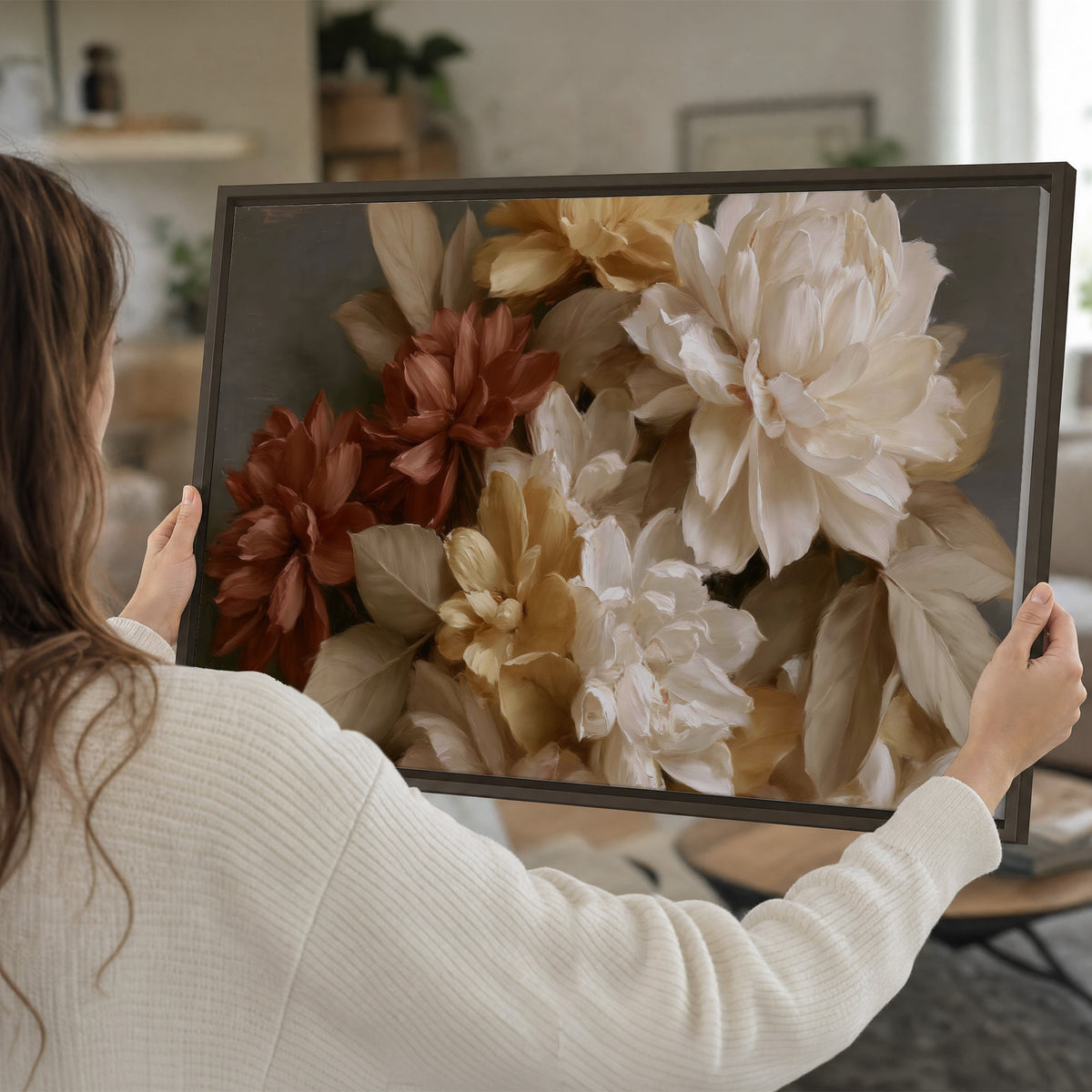 Full cream and rust-colored peonies in a softly shadowed still-life arrangement single framed canvas wall art held in hands