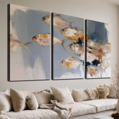 Small blue and golden fish moving across a pale layered abstract background 3 piece canvas wall art room and product view