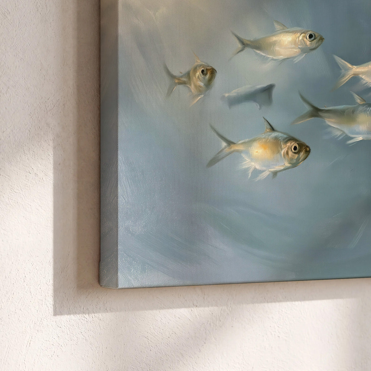 A small school of pale golden fish swimming across dark blue-green water 3 piece canvas wall art material and edge close up