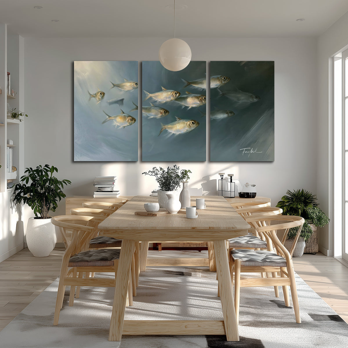 A small school of pale golden fish swimming across dark blue-green water 3 piece canvas wall art room and product view
