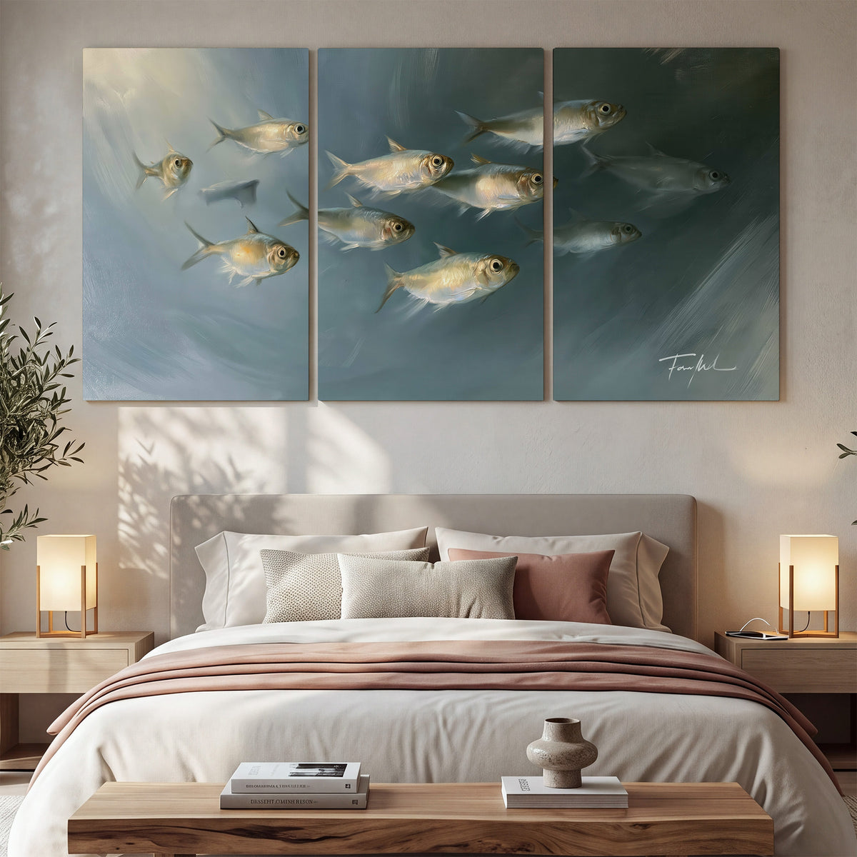 A small school of pale golden fish swimming across dark blue-green water 3 piece canvas wall art displayed in a bedroom