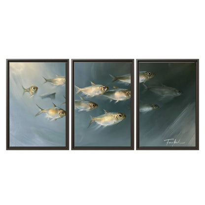 A small school of pale golden fish swimming across dark blue-green water 3 piece framed canvas wall art viewed straight on