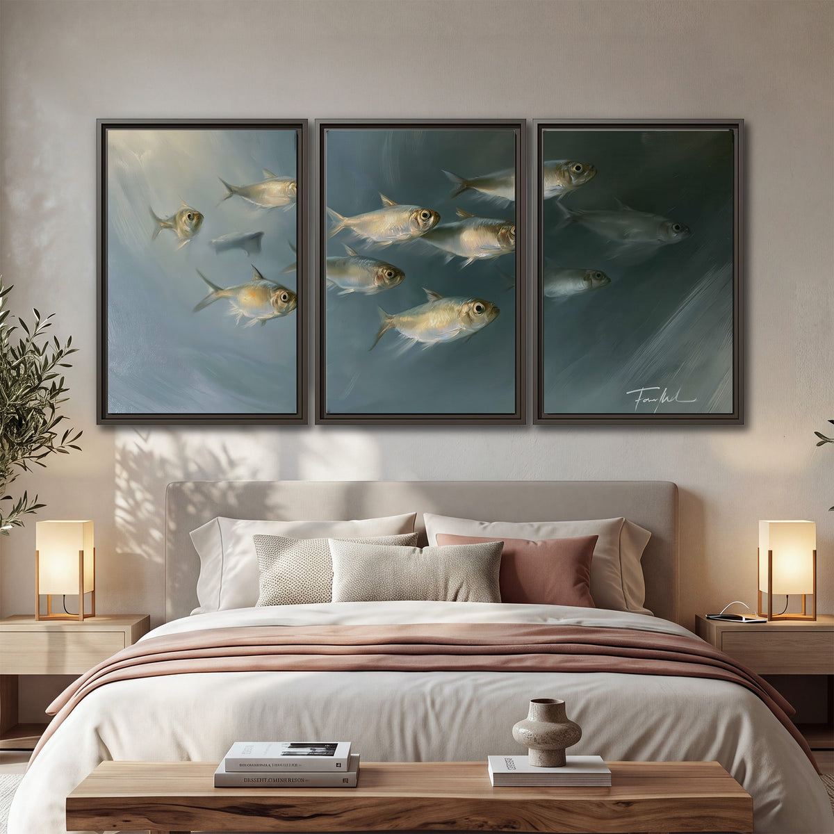 A small school of pale golden fish swimming across dark blue-green water 3 piece framed canvas wall art displayed in a bedroom