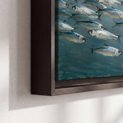 A school of silver fish moving together through cool blue water 3 piece framed canvas wall art material and edge close up