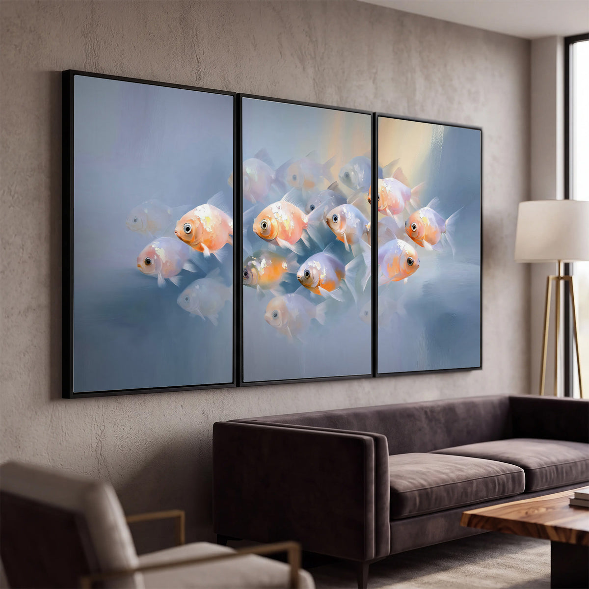 Rounded peach and gold fish floating in a softly lit blue underwater scene 3 piece framed canvas wall art displayed in a modern living room