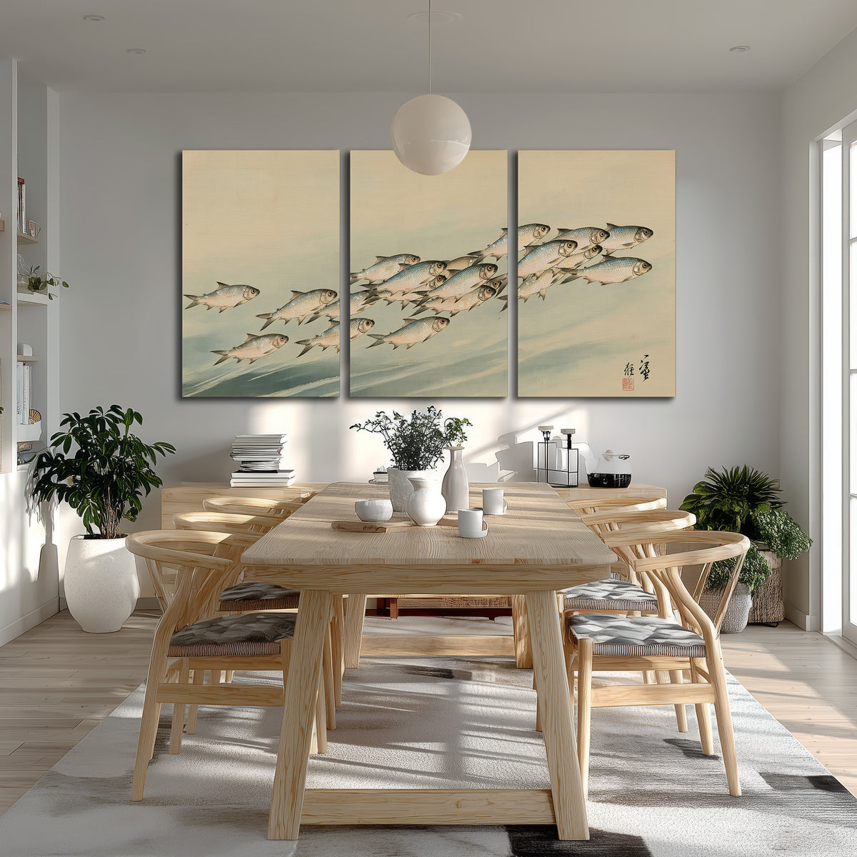 A flowing school of small fish above pale blue water on a cream ground 3 piece canvas wall art room and product view
