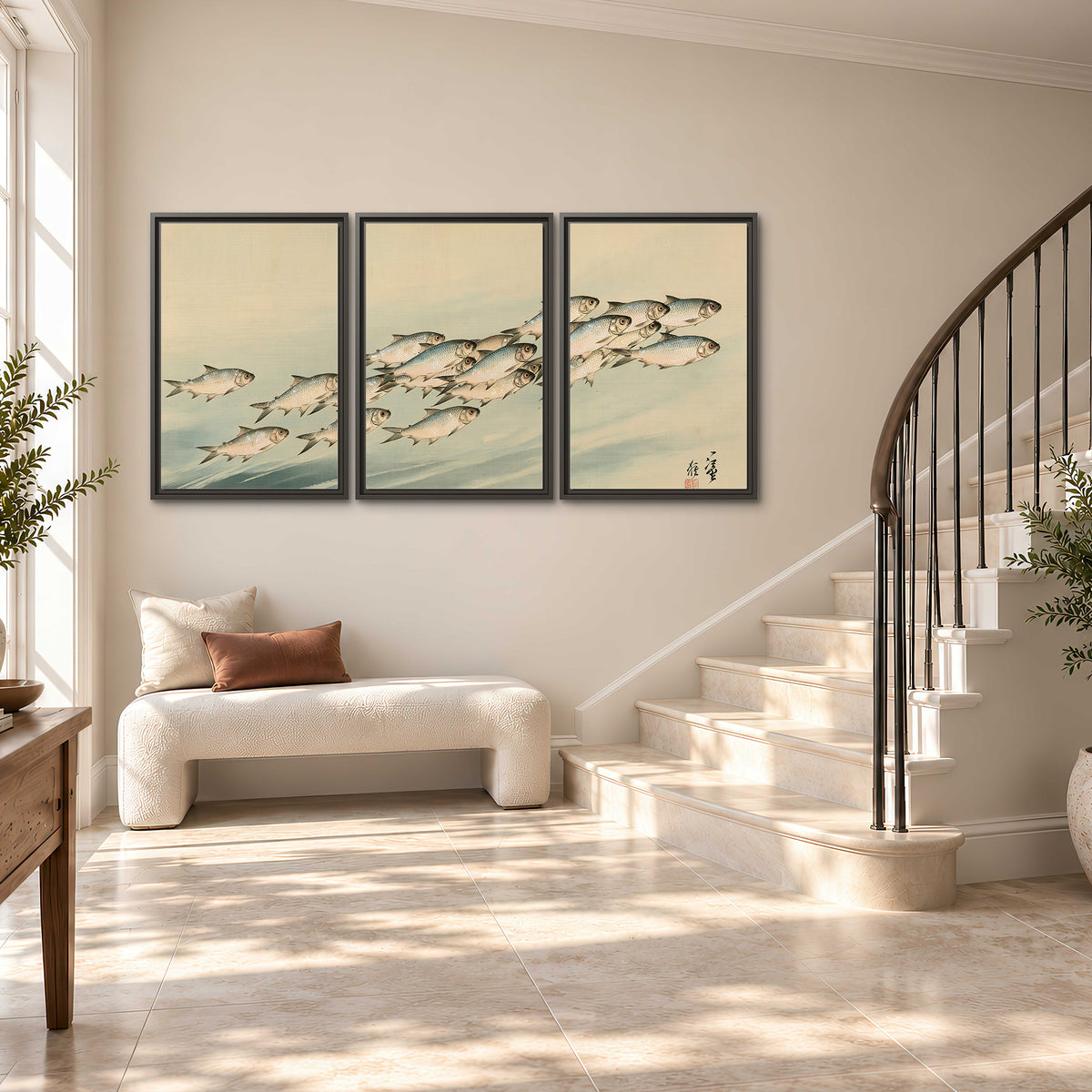 A flowing school of small fish above pale blue water on a cream ground 3 piece framed canvas wall art styled in an interior