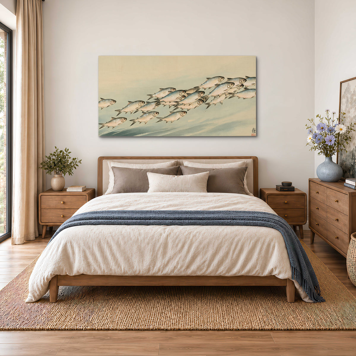 A flowing school of small fish above pale blue water on a cream ground single canvas wall art styled in an interior