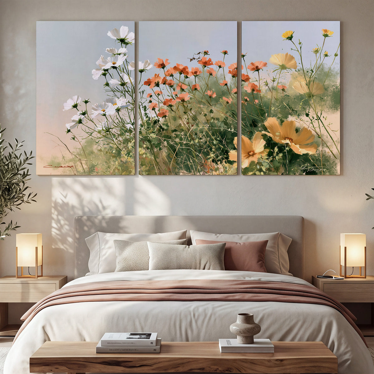 White and orange meadow flowers with fine green stems under a pale sky 3 piece canvas wall art displayed in a bedroom