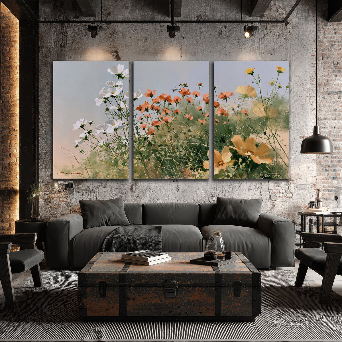 White and orange meadow flowers with fine green stems under a pale sky 3 piece canvas wall art displayed in a industrial room