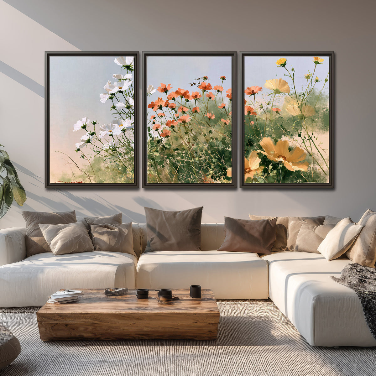 White and orange meadow flowers with fine green stems under a pale sky 3 piece framed canvas wall art displayed in a living room