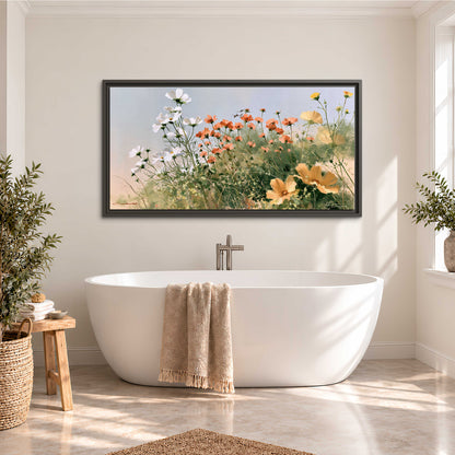 White and orange meadow flowers with fine green stems under a pale sky single framed canvas wall art styled in an interior