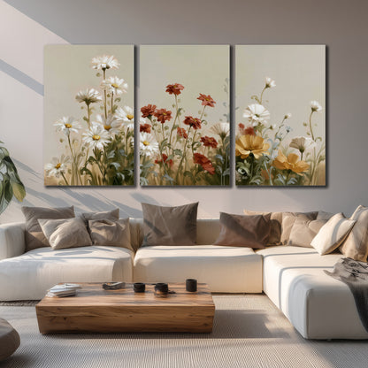 White wildflowers and warm red blossoms rising against a soft beige background 3 piece canvas wall art displayed in a living room